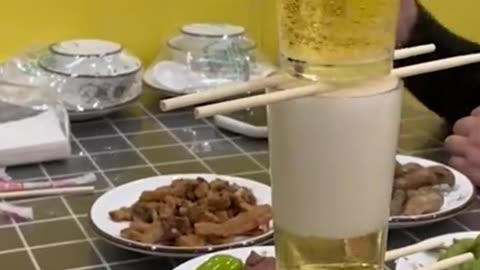 Filling three glasses of beer at once