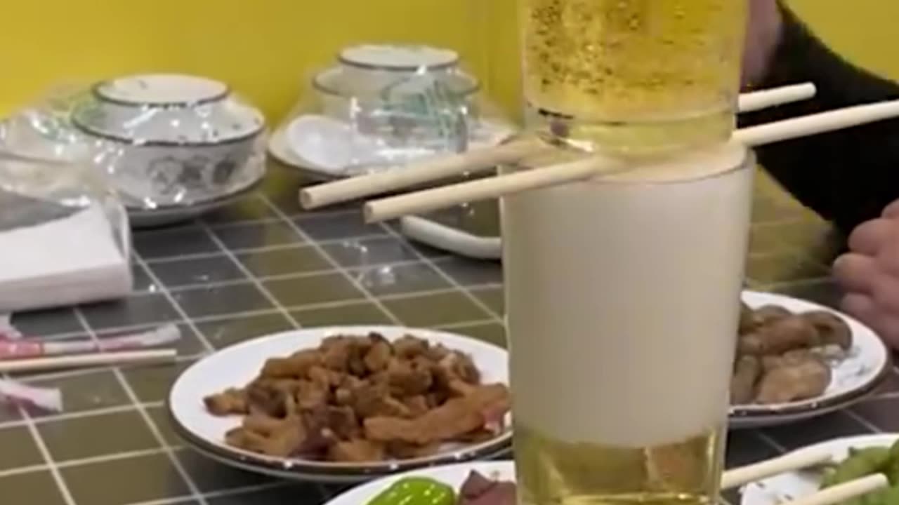 Filling three glasses of beer at once