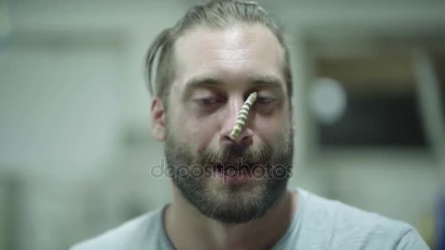 man Speaking Silkworm His Nose