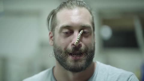 man Speaking Silkworm His Nose