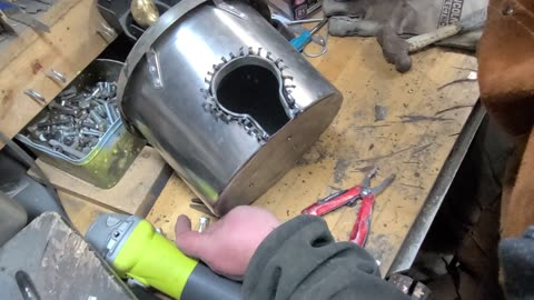 step by step build of an artistic birdhouse out of bits and pieces of scrap metal from the shop