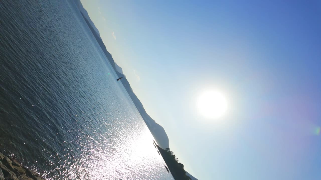 Sunny 180-Degree Panoramic View of the Coastline