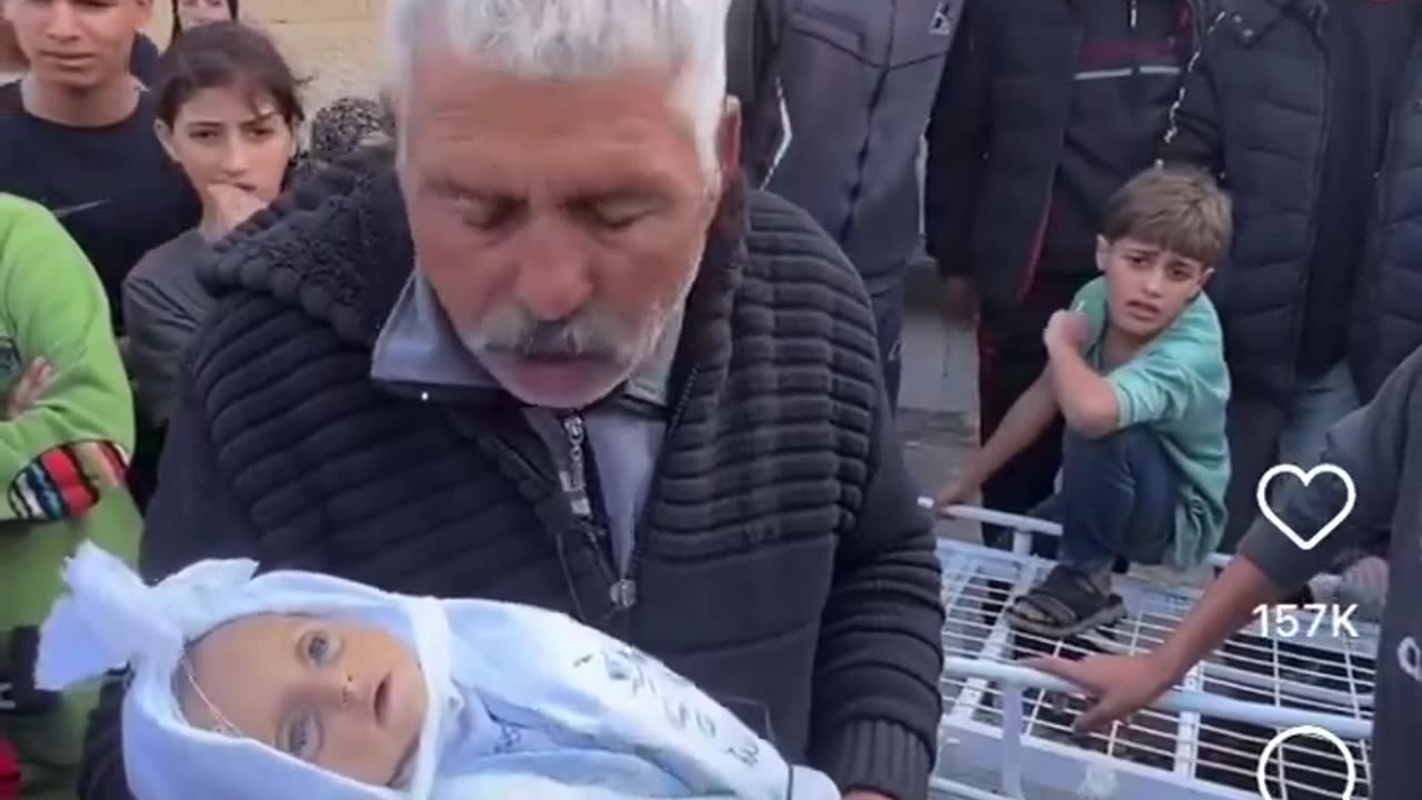 Palestinian Pretending Doll Is His Dead Grand Daughter