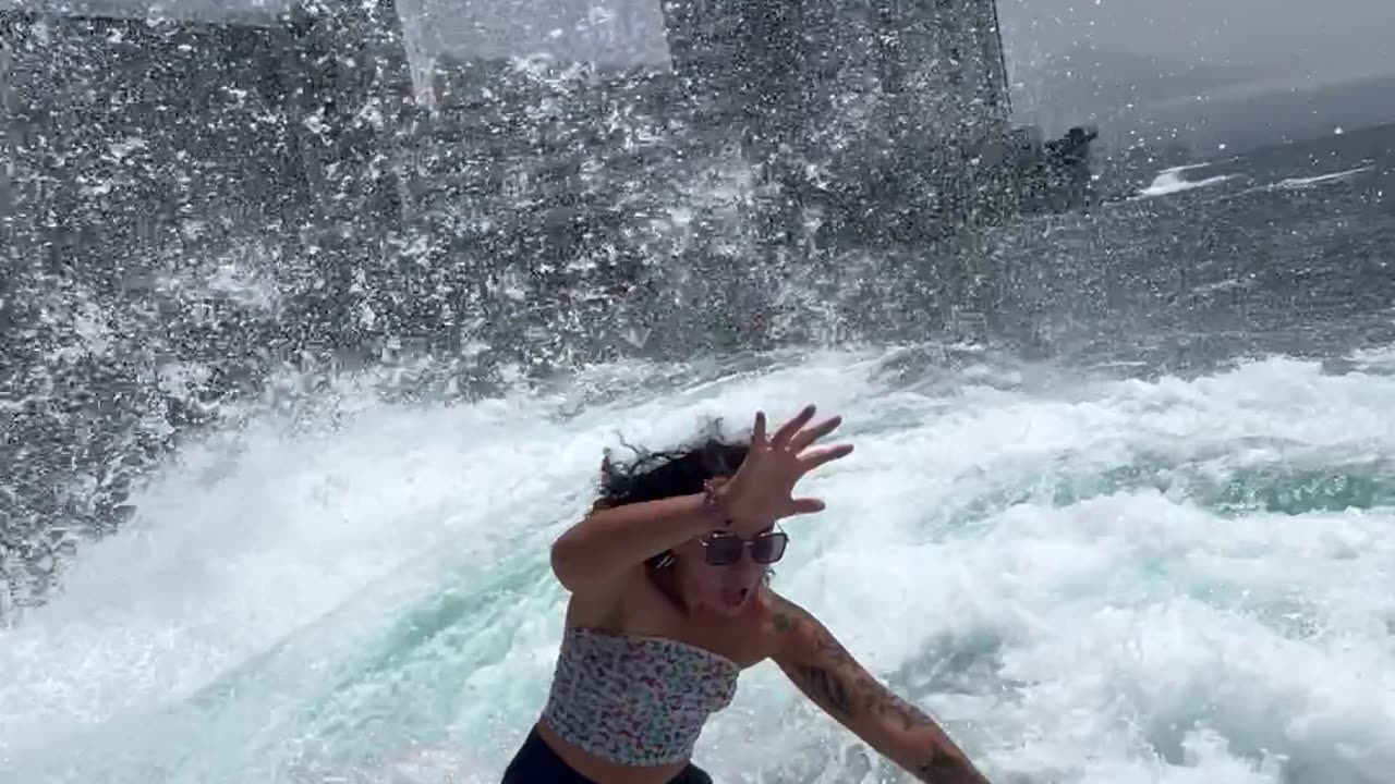 Wave Sweeps Girl Off Her Feet