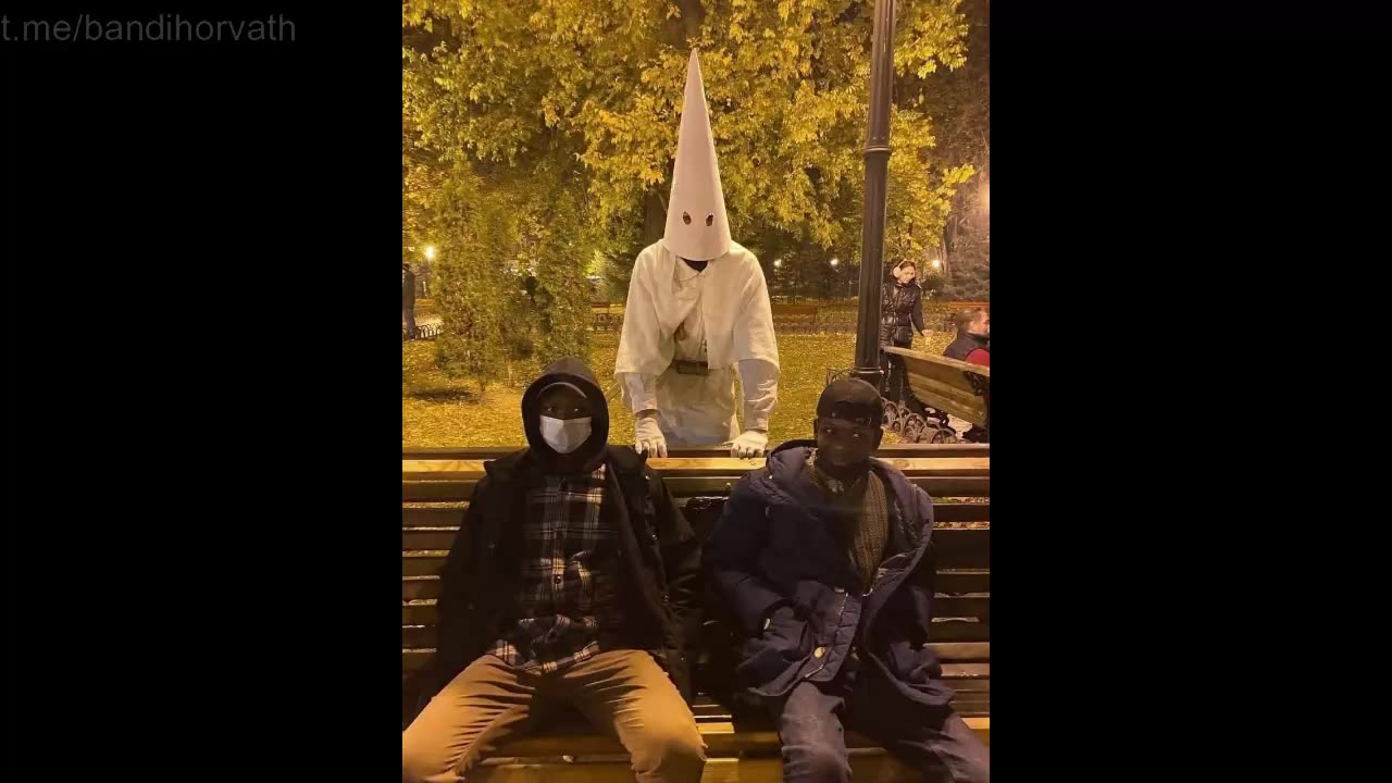 2021 Kiev Halloween young people walked around the city center in costumes of the Ku Klux Klan.