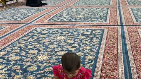 Baby playing in Haram