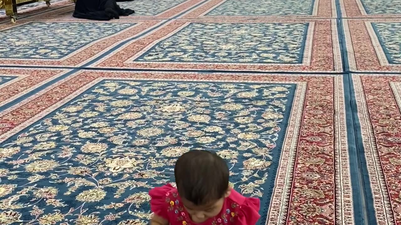 Baby playing in Haram