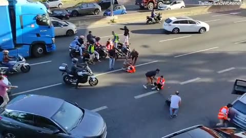 Climate protest abruptly ends as drivers drag activists out the way