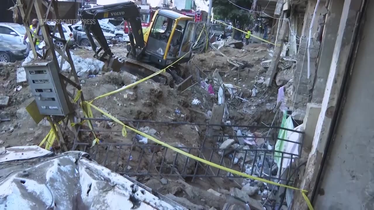 Beirut suburb wakes up to collapsed buildings after Israeli airstrike kills 31