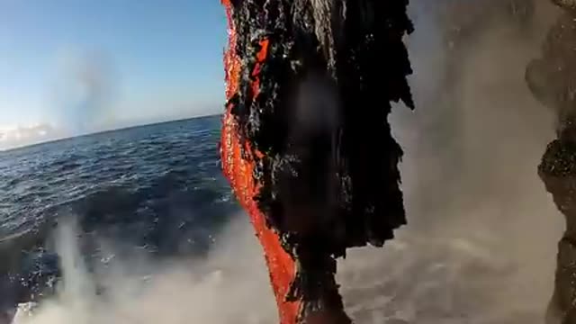 Amazing up close footage of Lava entering the ocean.