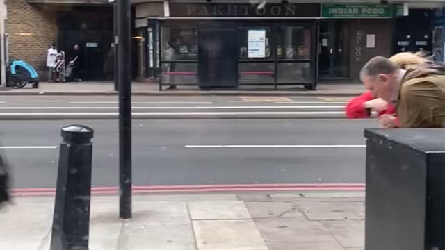 Storm Eunice Blows Away Pedestrians