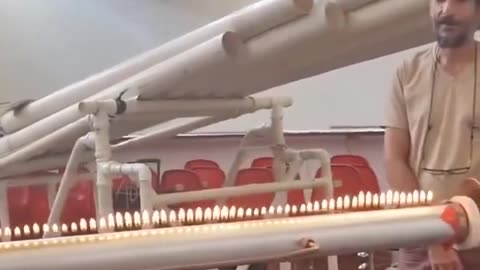 THIS TRUMPET PLAYER USES FIRE TO CREATE SPECTACULAR SOUNDWAVE ART