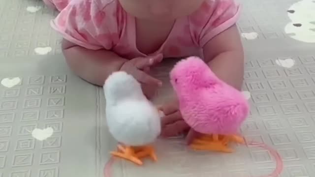 Cute kid with chicks