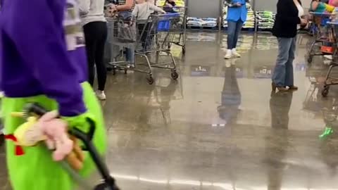 The janitor in the supermarket wearing a mask