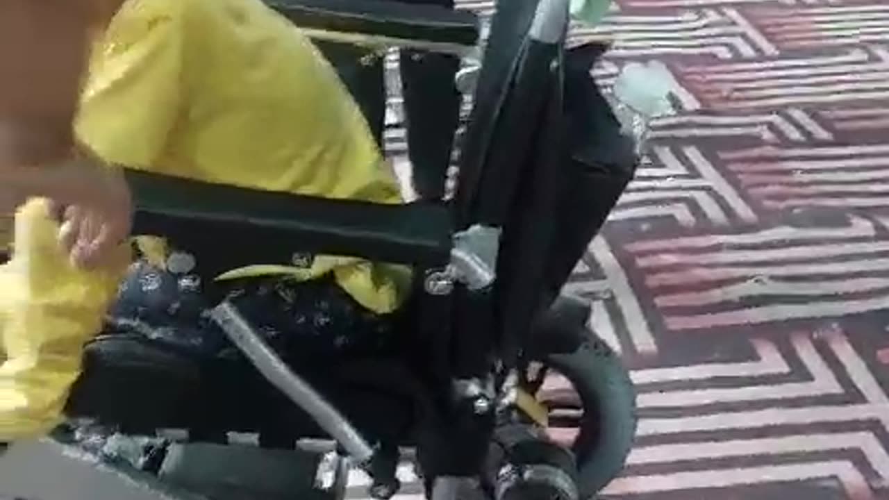 Watch a Child's Joy with the Evox Electric Wheelchair: Playing Basketball and More!