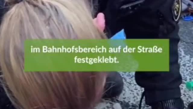 Eco idiot in Germany glues his hand to the road to "save the planet"