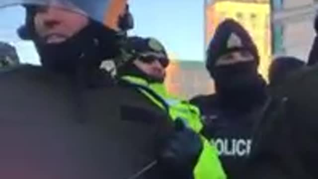 Canada Cops Trample Woman As She pleads for "PEACE, LOVE & HAPPINESS"