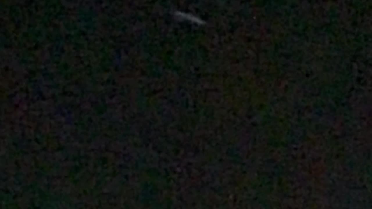 Strange cigar UFO (mothership?) spotted over my backyard 10/26/24 6:55p (2 of 3).