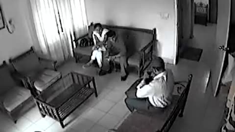 CCTV footage stupid couple at office waiting room