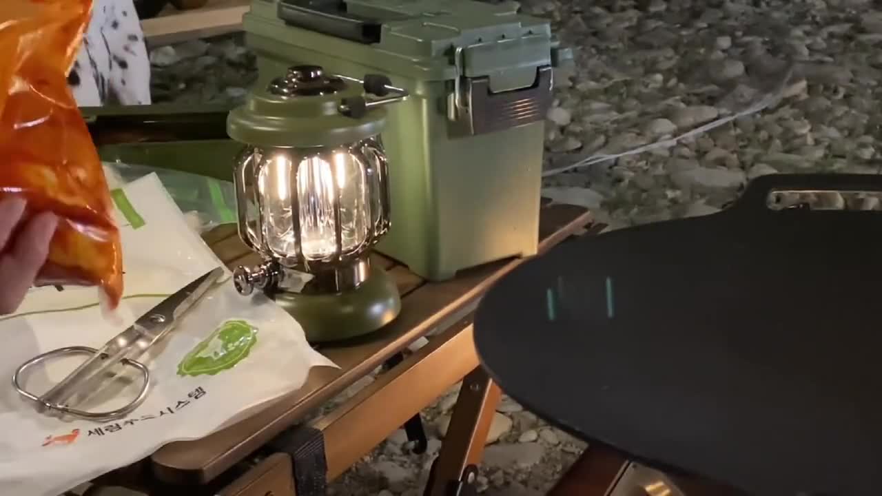 One person, one dog, camping by the river, enjoying the pleasure of exquisite camping