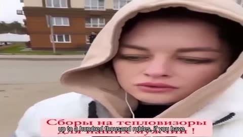 a Russian woman collects pennies for thermal imaging, to save mobile phones