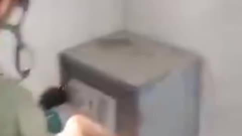 ISRAELI SOLDIERS FILM THEMSELVES AS THEY ARE BREAKING INTO A FAMILY'S SAFE IN GAZA (1)