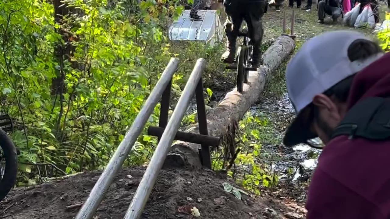 BMX Riders Attempt Challenging Log Ride