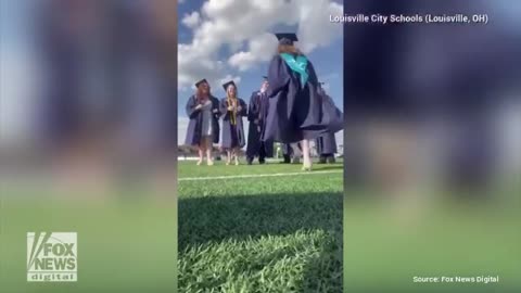 Graduation Video Gains Millions of Views Showing Kindergarteners "Transform into Seniors