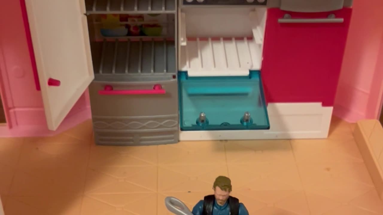 Clay checks out Barbie's giant cooking pot