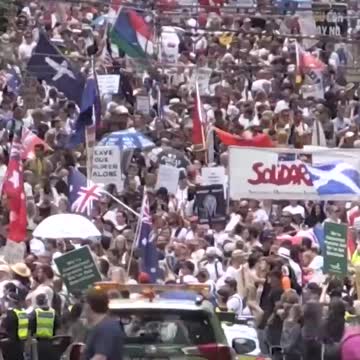 Thousands protest vaccine mandate in Melbourne despite Omicron wave.