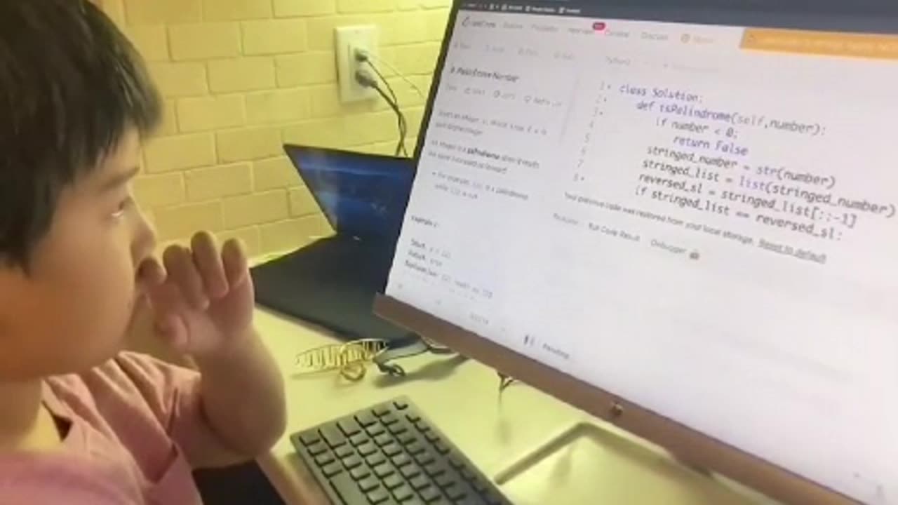 10 year old boy checking his coding ability