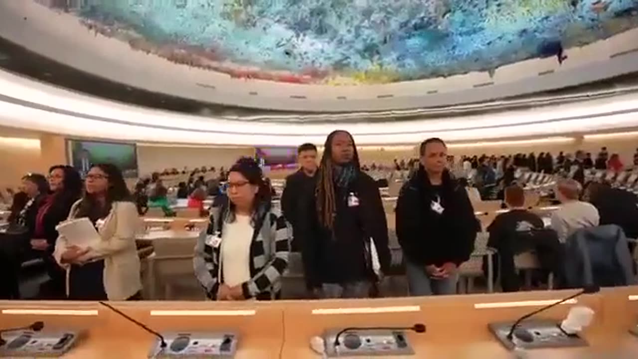 Participants turn their backs on US Ambassador Taylor in protest of Israeli genocide in Gaza