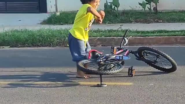 Keeping His Spirits High While Learning to Ride