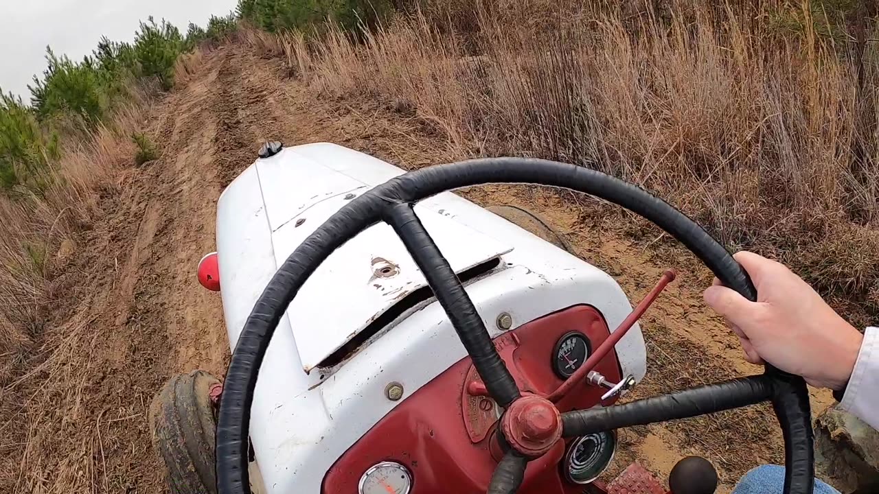 8N TRACTOR DOING ROAD WORK AT THE COLD FORGE RANCH