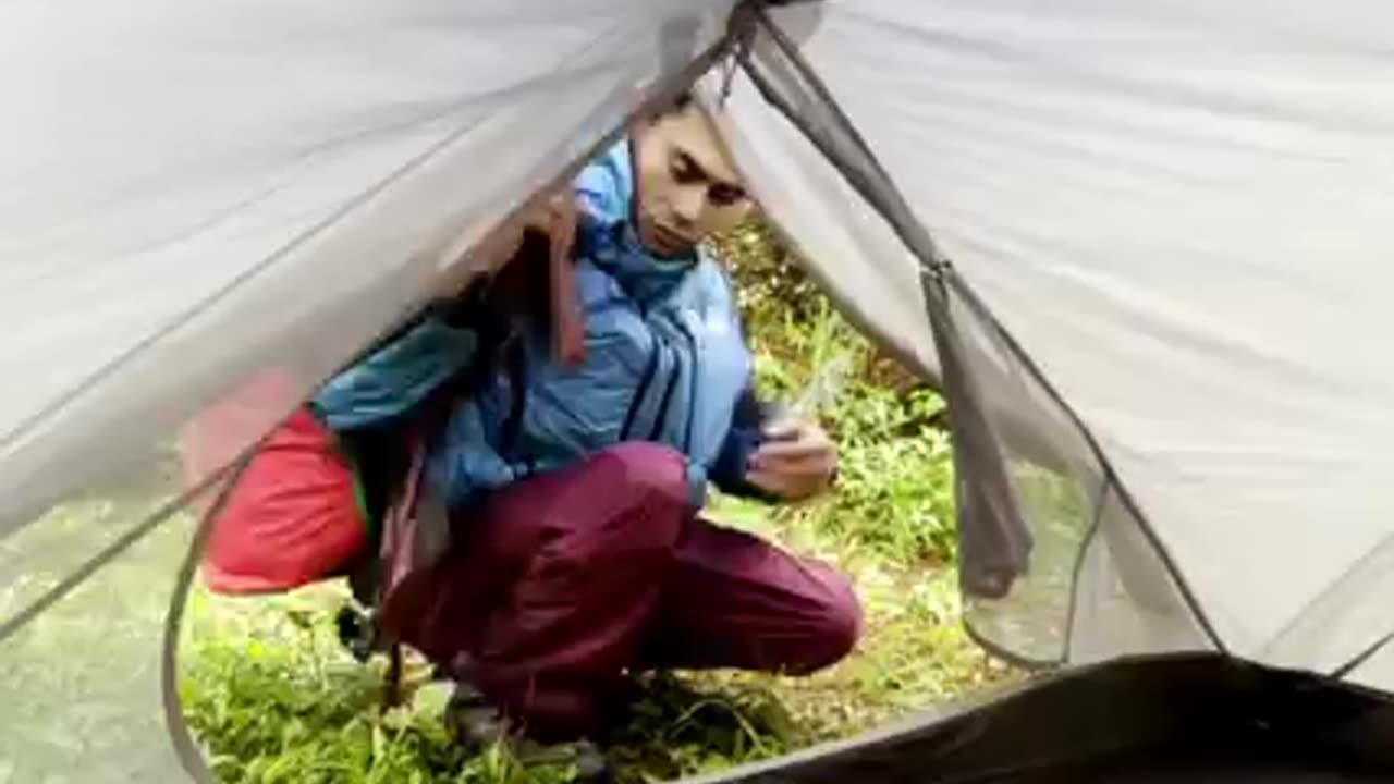 camping tent in heavy rain thunderstrome in rain