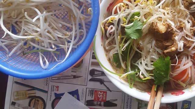 A beef stew along with rice noodle so amazing meal