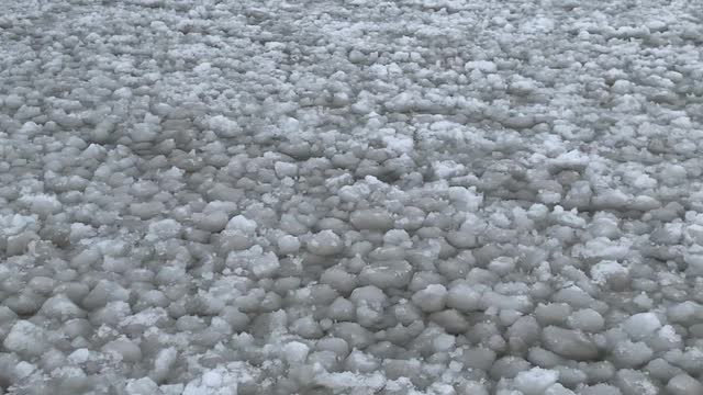 Perfect Conditions Create Unique Ice Formations on Frozen Lake