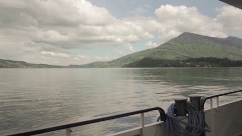 Mountain View Footage Taken Aboard A Moving Boat