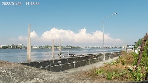 Timelapse of Wat Krokkrak Ferry and Clouds