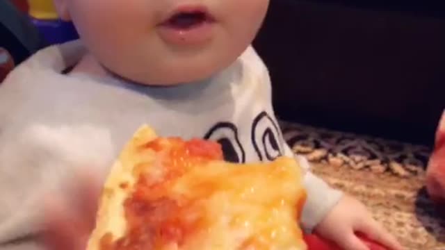 Baby mozzy so cute first time to Chuck Cheeses pizza