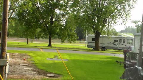 Distant Thunderstorm with a shower in the area and sunshine 7-26-2015