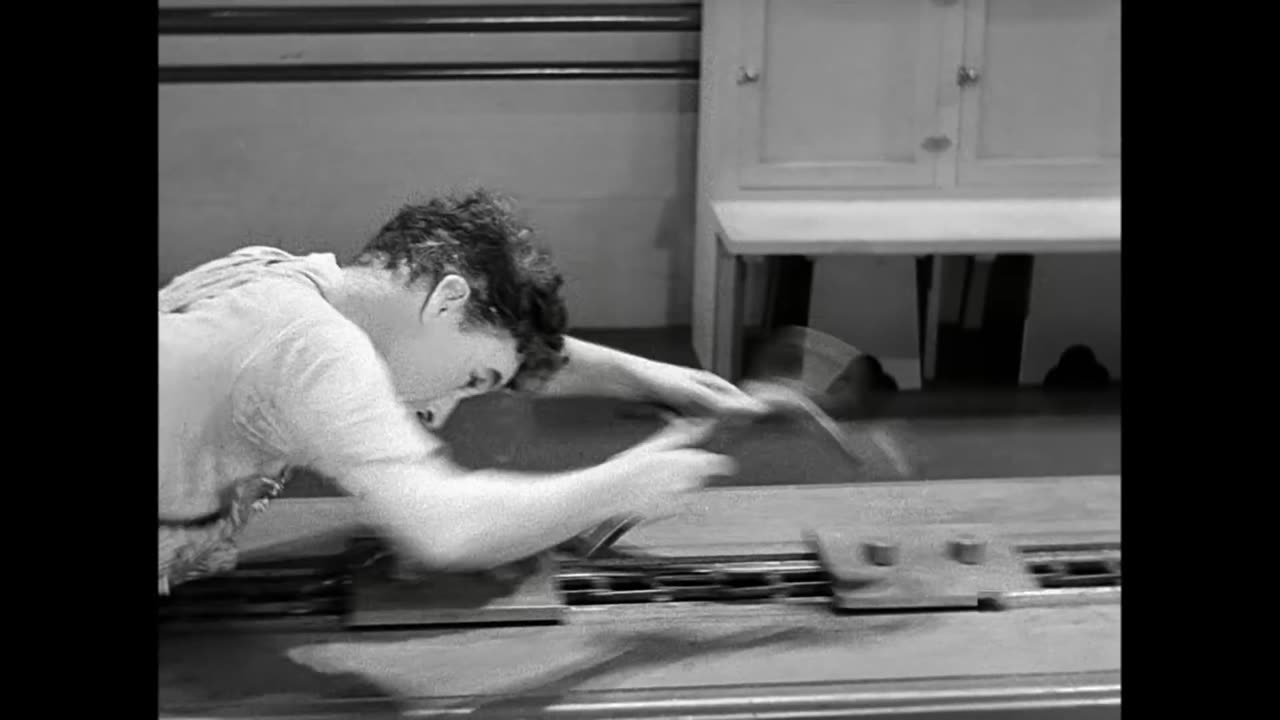 Charlie Chaplin Swallowed by a Factory Machine - Modern Times (1936)