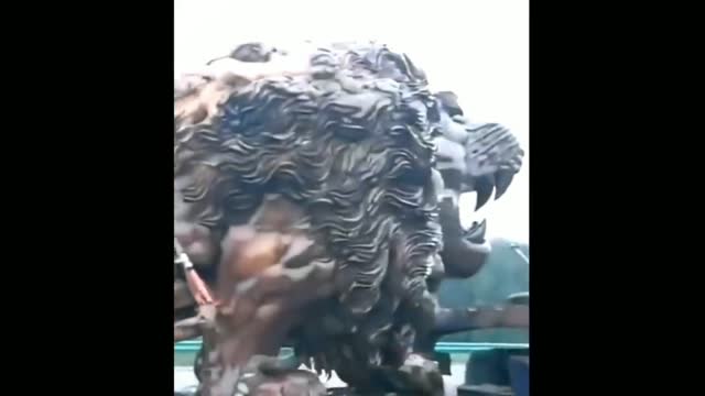 Lion Statue Is Being Taken Away By Truck