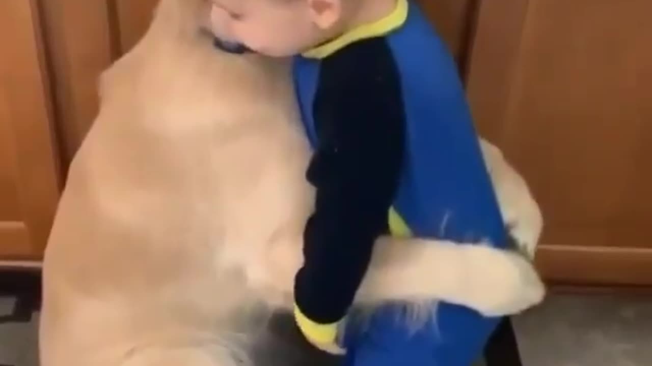 Unconditional love! This furry friend knows how to comfort and protect its little human