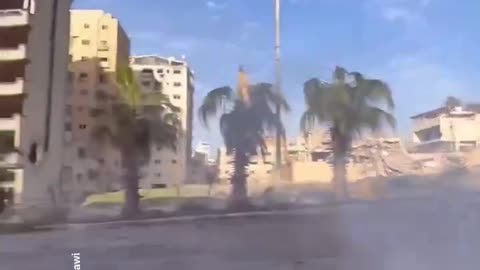 IDF soldier hitting Hamas terrorists hiding in this building.