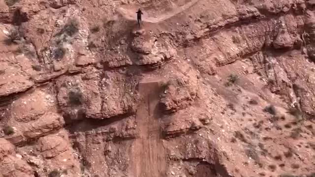 Fearless few riding on the cliff