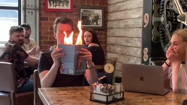 Burning book magic trick 🤯🔥