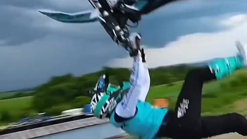 Boy is jumping on bike