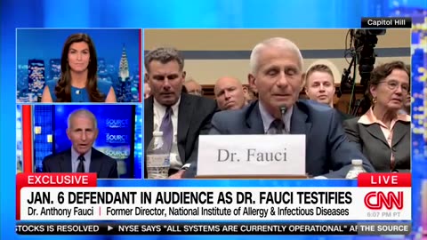 Fauci has a J6er make faces behind him during his testimony.