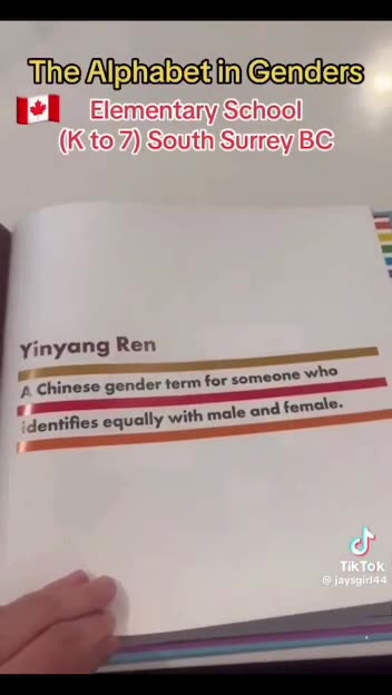 A parent shows a book her child brought home from elementary school in Surrey, BC, Canada.